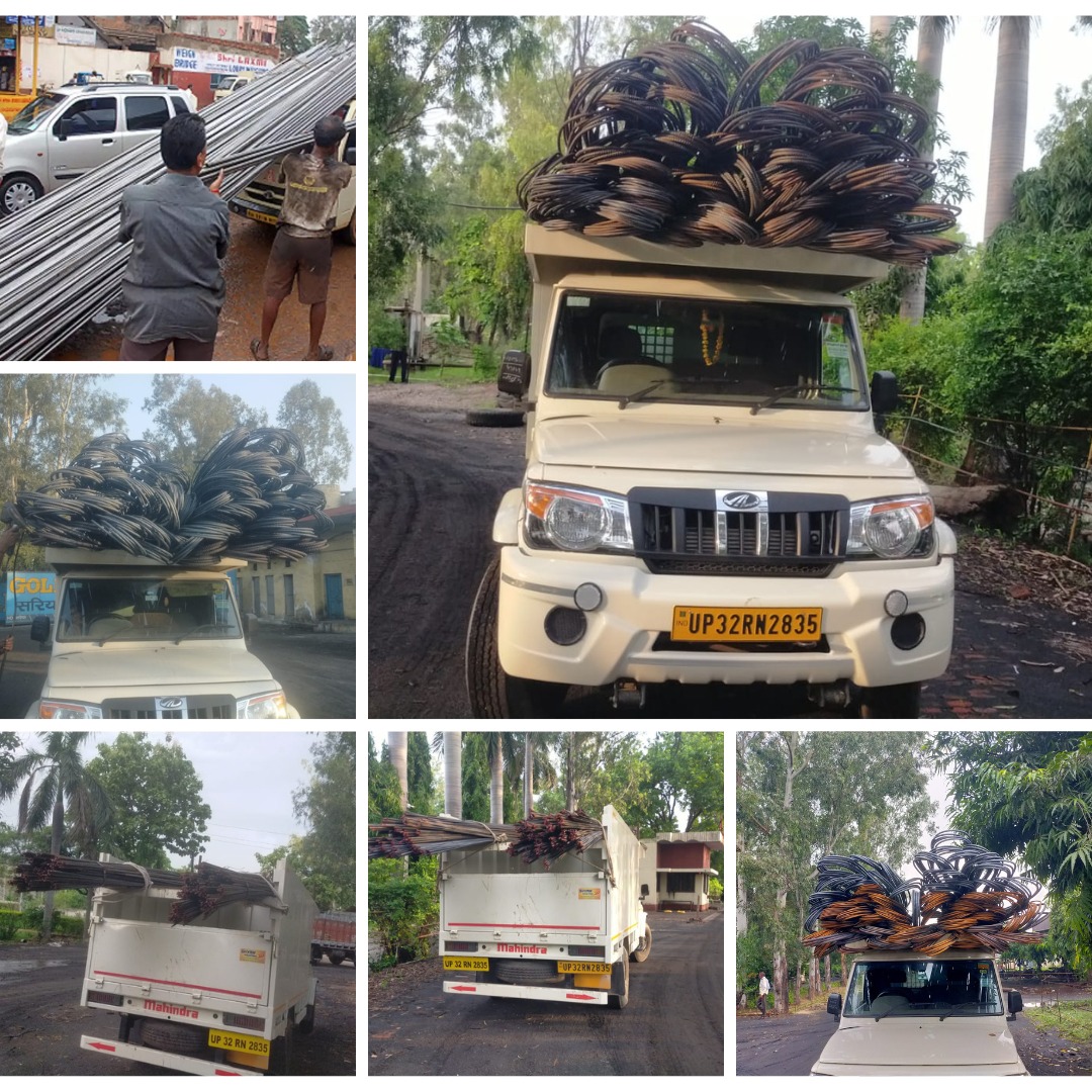 Mahindra pickup delivery vehicle loaded with TMT steel saria coils at Lucknow site